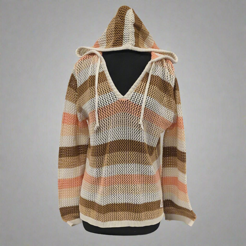 Buc-ee's Baja Woven Hoodie is a brown, cream, and pink woven/knitted hoodie material used as a cover up. 