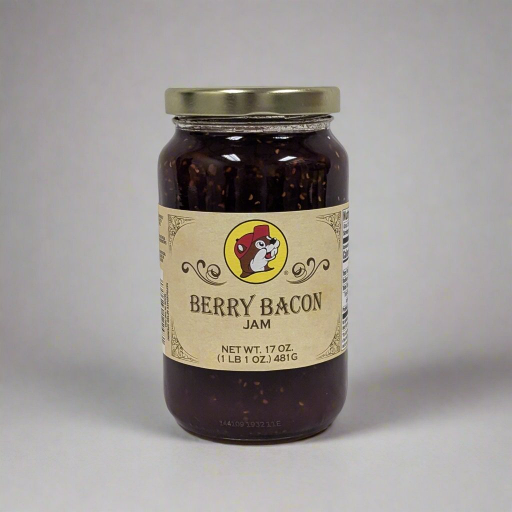 A 17 oz. jar of Berry Bacon Jam with a golden lid, featuring a rustic label and a rich, dark blend of smoky bacon and sweet berries visible through the jar.




