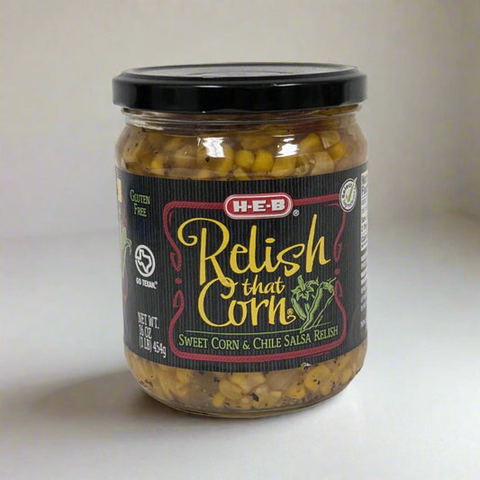 Front view of H-E-B Relish That Corn - Sweet Corn & Chile Salsa Relish jar with a black lid.